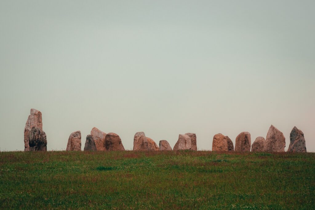 pexels photo 12556535 12556535 Serene landscape of ancient stone circle in Skåne, Sweden, during daytime.